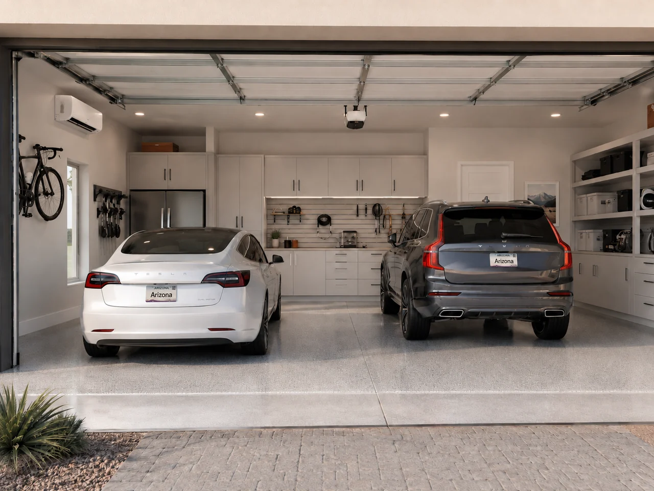 Two-car Arizona garage with storage, a refrigerator and a ductless wall unit